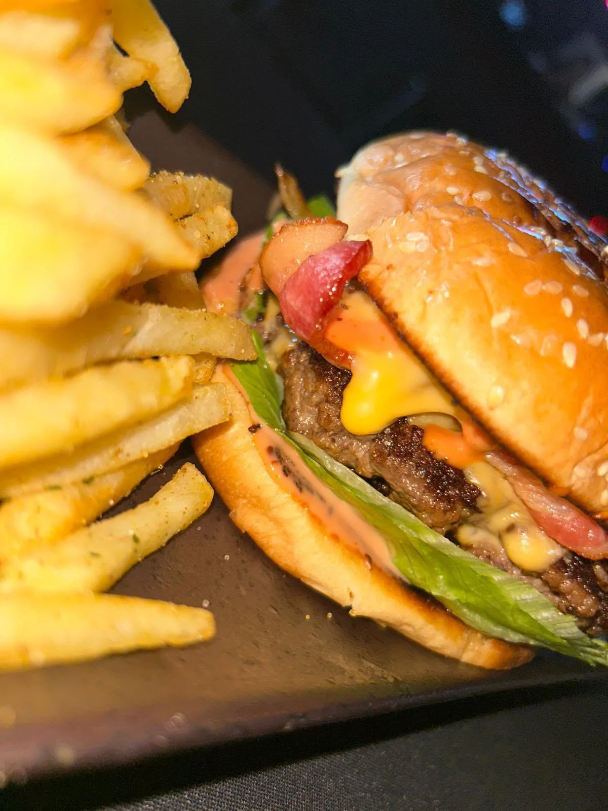 Club VIP burger served with fries