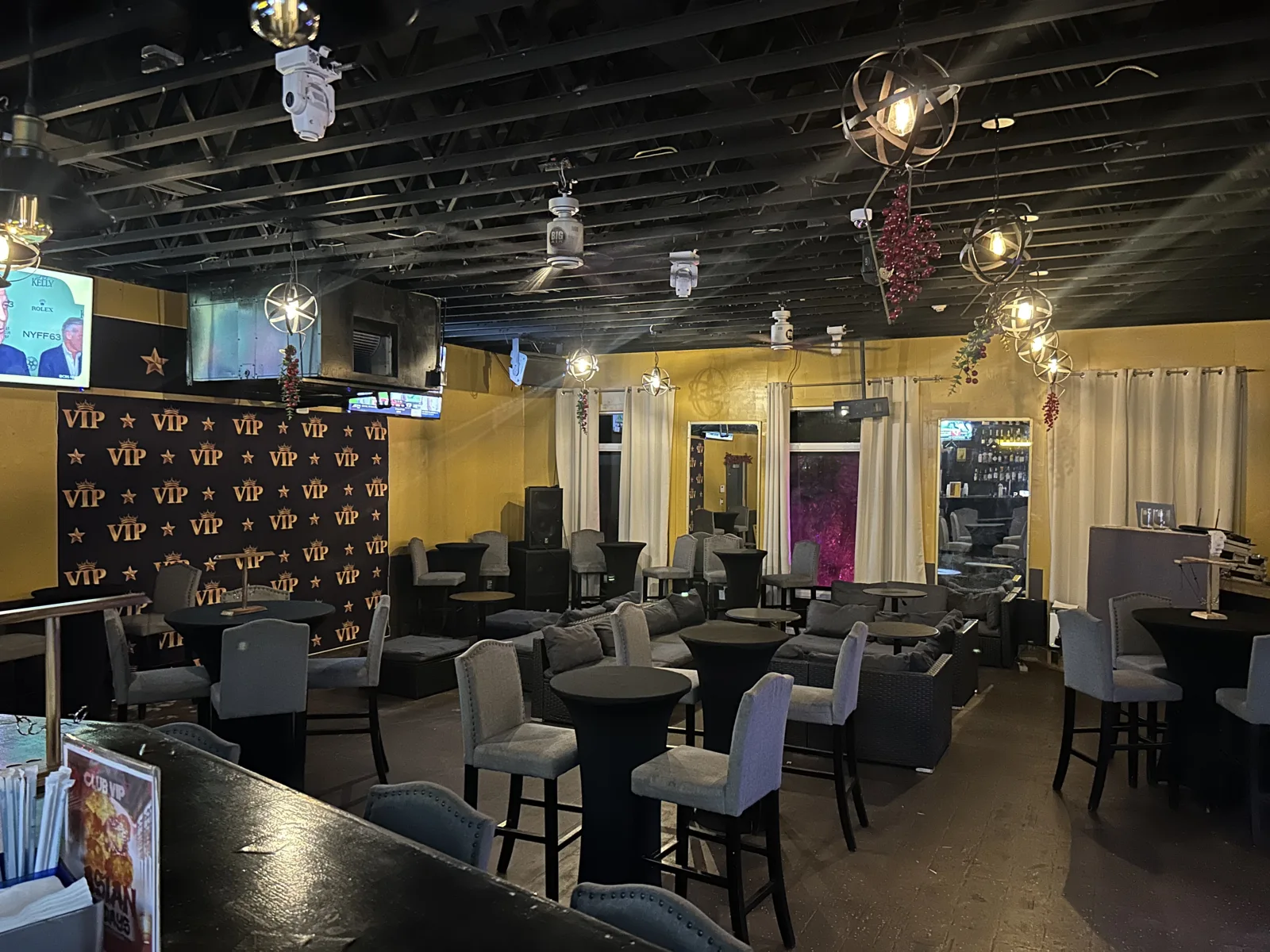 Club VIP lounge seating and screens